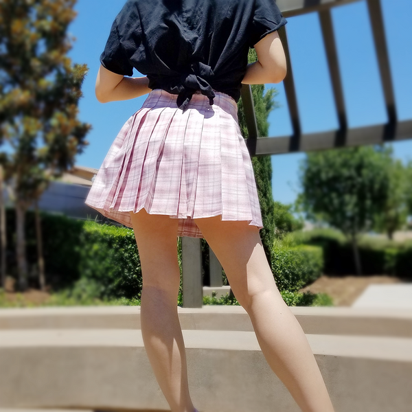Pink plaid pleated mini skirt deals